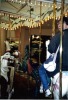 [Alden rides the carousel]
